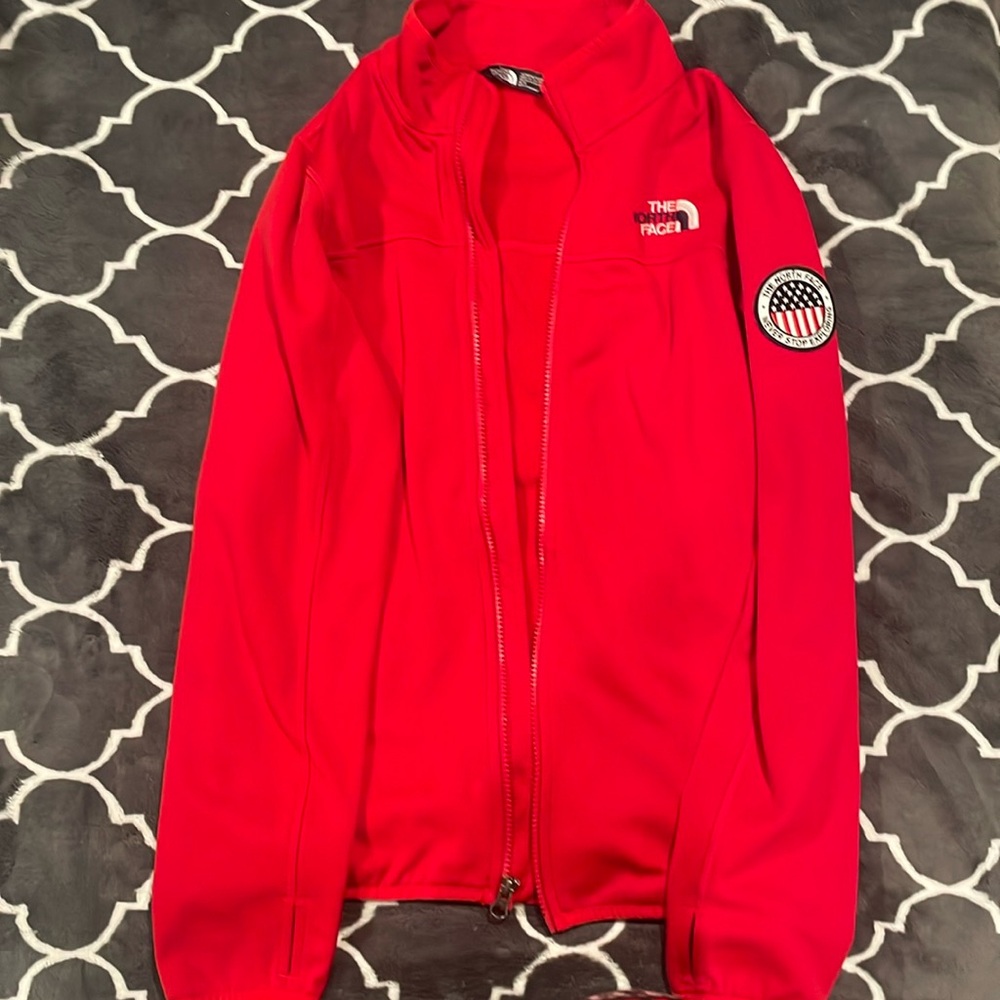 Red women’s The North Face sweatter